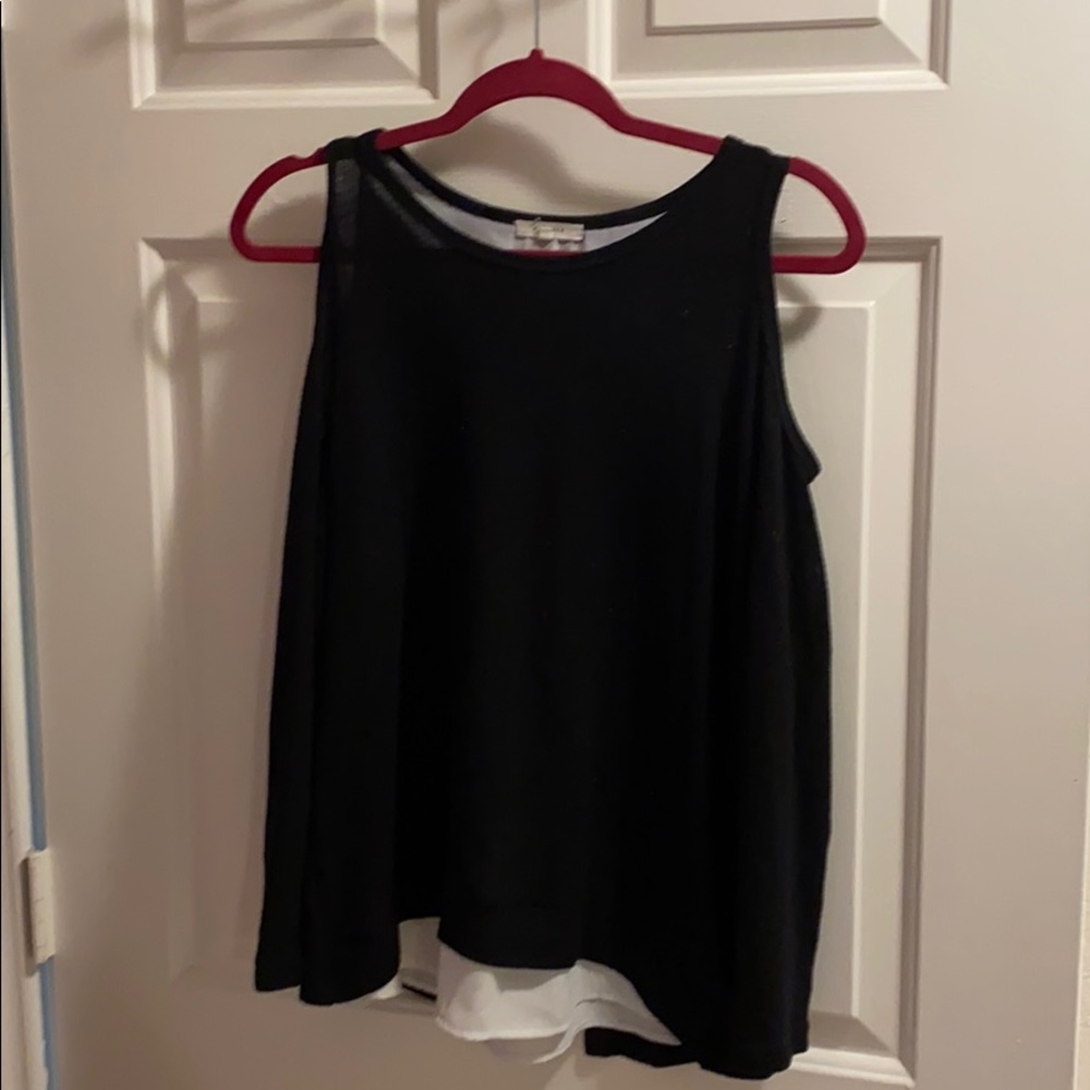 Black sweater with white lining underneath
